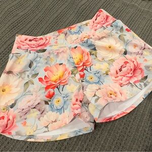 Floral running athletic shorts size medium.
